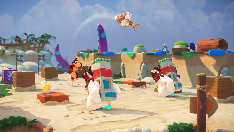 Donkey Kong tosses Rabbid Cranky in this PR shot of Mario + Rabbids’ new expansion.